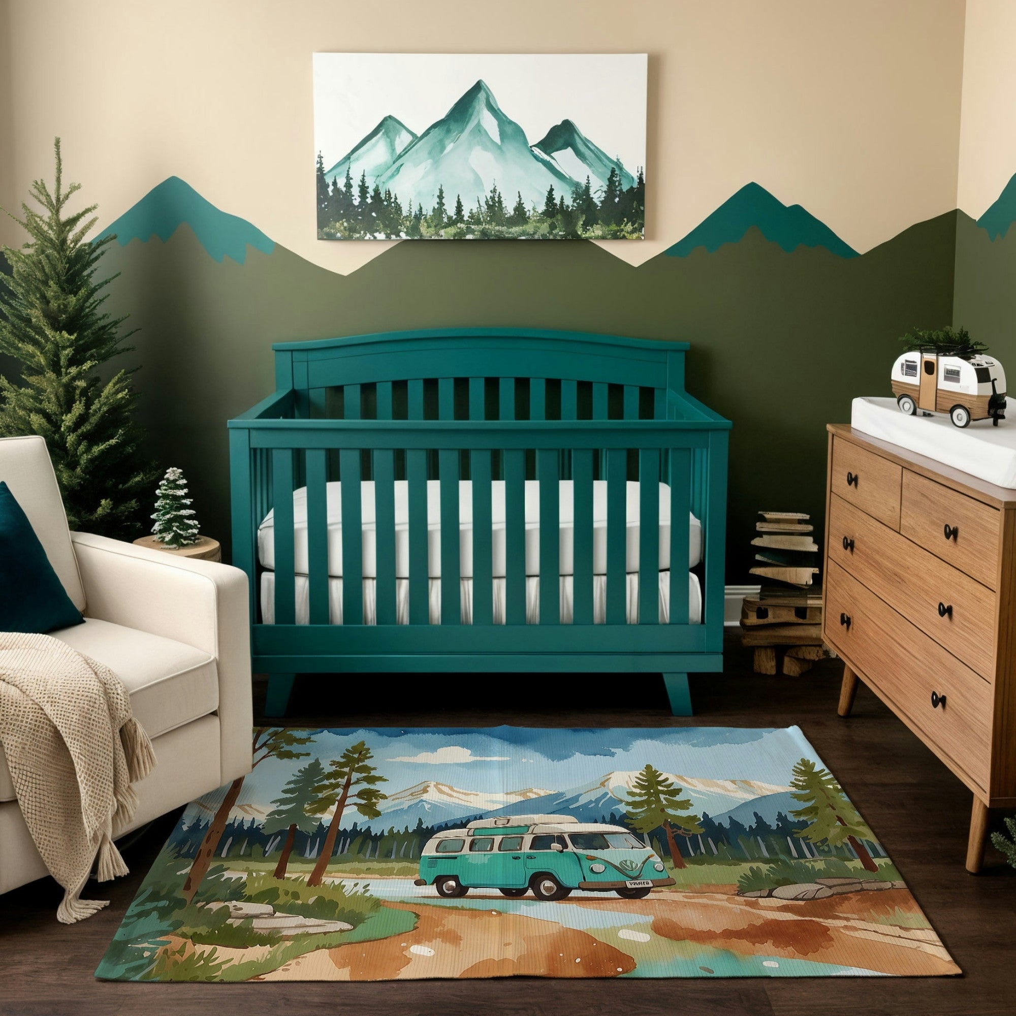 A camping-themed nursery featuring a teal crib, a natural wood dresser with a changing pad, and a white armchair with a beige throw blanket. The decor includes a mountain wall mural, a framed painting of mountains, and a toy camper van on the dresser. The room is complemented by a vibrant area rug depicting a retro teal camper van in a forested landscape with mountains in the background, creating an adventurous and cozy atmosphere.