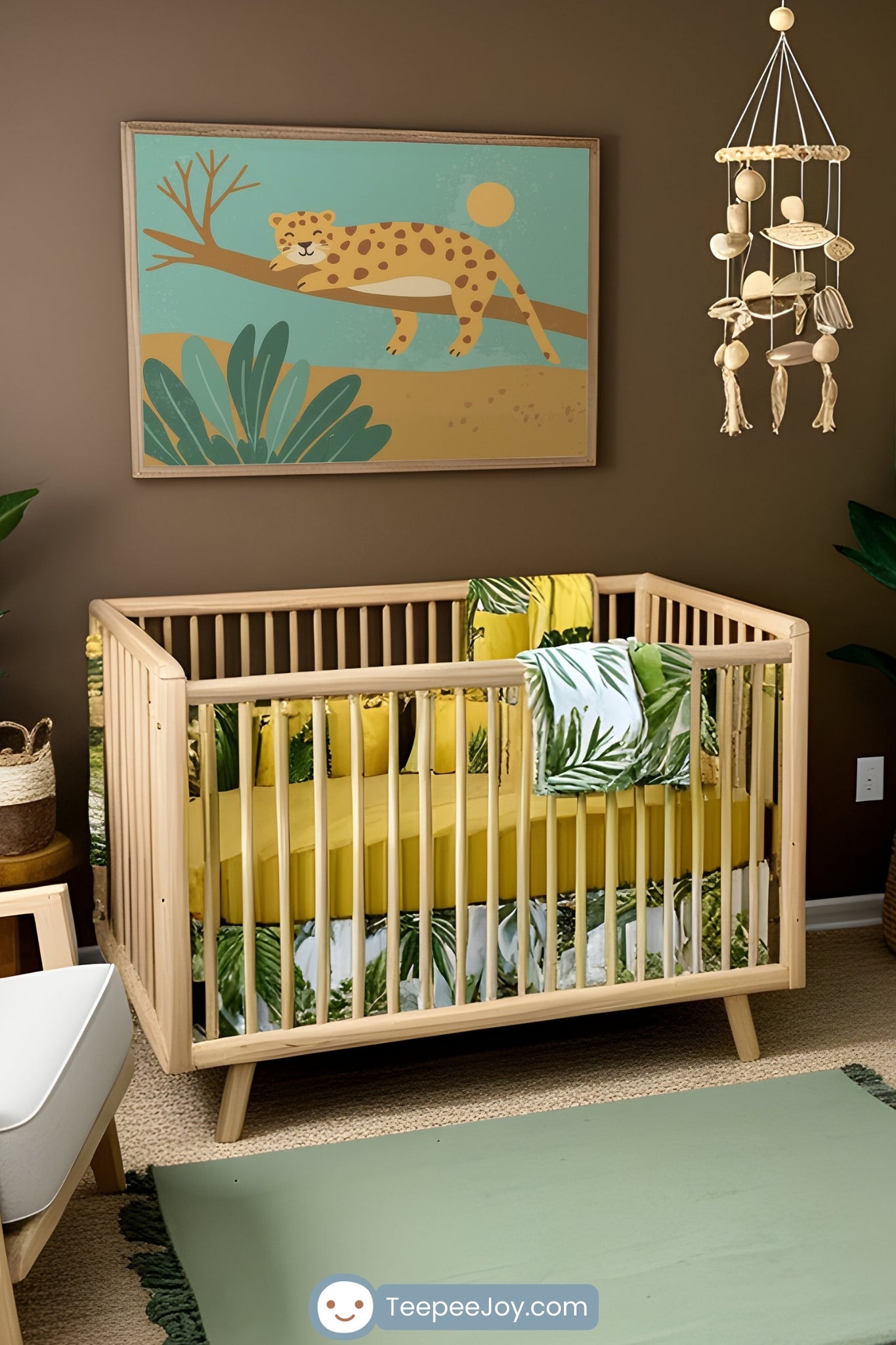 A jungle-themed nursery with a brown accent wall featuring a framed illustration of a cheetah lounging on a tree branch. The room includes a natural wood crib with yellow and leaf-patterned bedding, a green rug, and lush potted plants. Additional decor includes a woven mobile, macrame wall hanging, and a dresser with a yellow changing pad, creating a vibrant, tropical atmosphere.