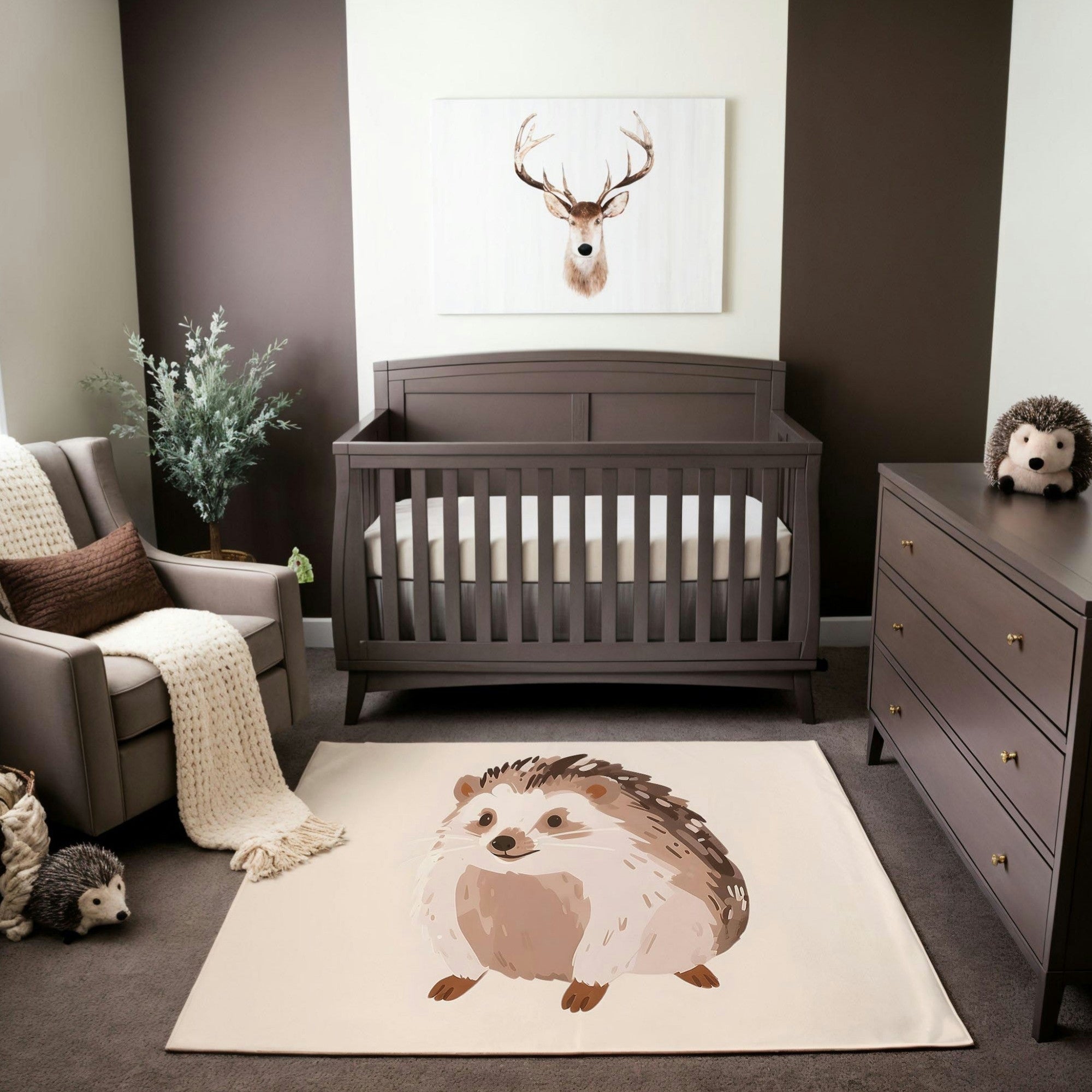 A woodland-inspired nursery featuring a dark gray crib and matching dresser, complemented by a soft gray armchair with a knit throw and brown pillow. The decor includes a whimsical area rug with a hedgehog illustration and hedgehog plush toys, along with a minimalist deer painting on the wall. The neutral color palette and natural accents, including a leafy plant, create a cozy and earthy atmosphere.