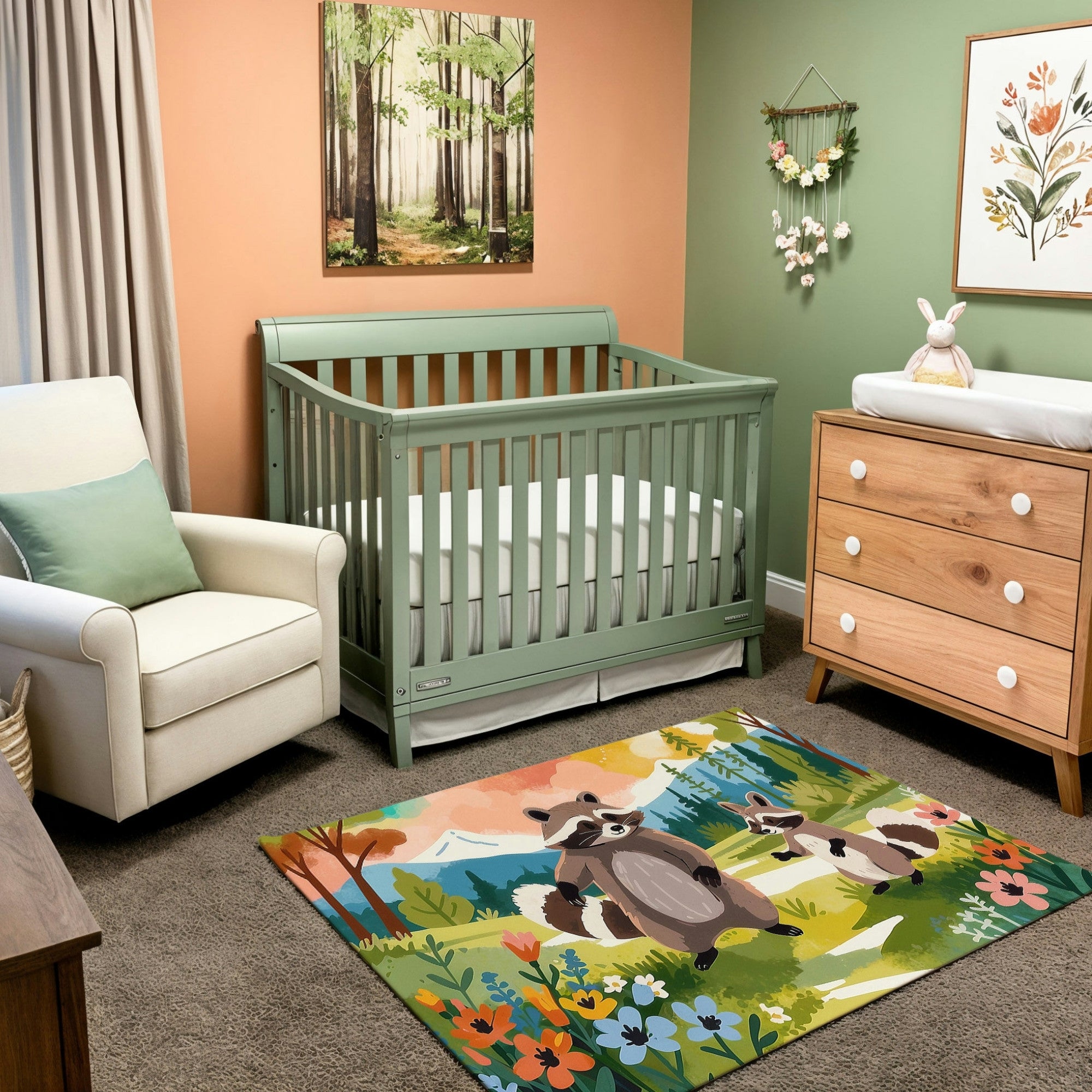 A woodland-themed nursery featuring a mint green crib, a natural wood dresser with a changing pad, and a white armchair with a soft green pillow. The room includes nature-inspired decor, such as a framed forest painting, a floral wall hanging, and a colorful area rug with playful raccoon illustrations surrounded by wildflowers. The soft peach and green walls add a warm and tranquil ambiance to the space.