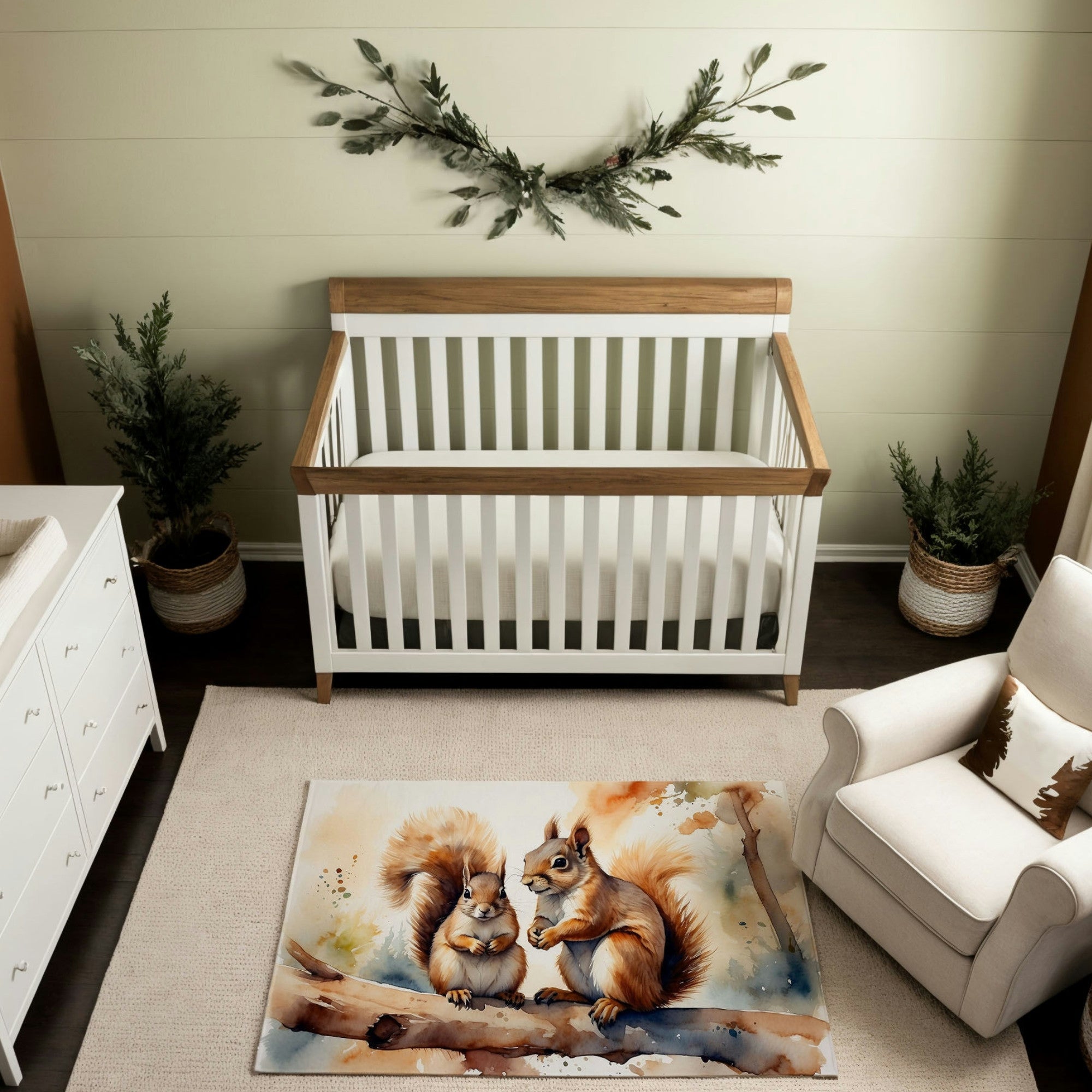 A woodland-themed nursery featuring a white crib with wooden accents, complemented by greenery decor hung above. The room includes a white dresser, a cozy armchair with a tree-patterned pillow, and natural baskets filled with plants. The centerpiece is a watercolor-style rug illustrating two squirrels perched on a branch, surrounded by soft earthy and blue tones, adding a whimsical and natural charm to the space.